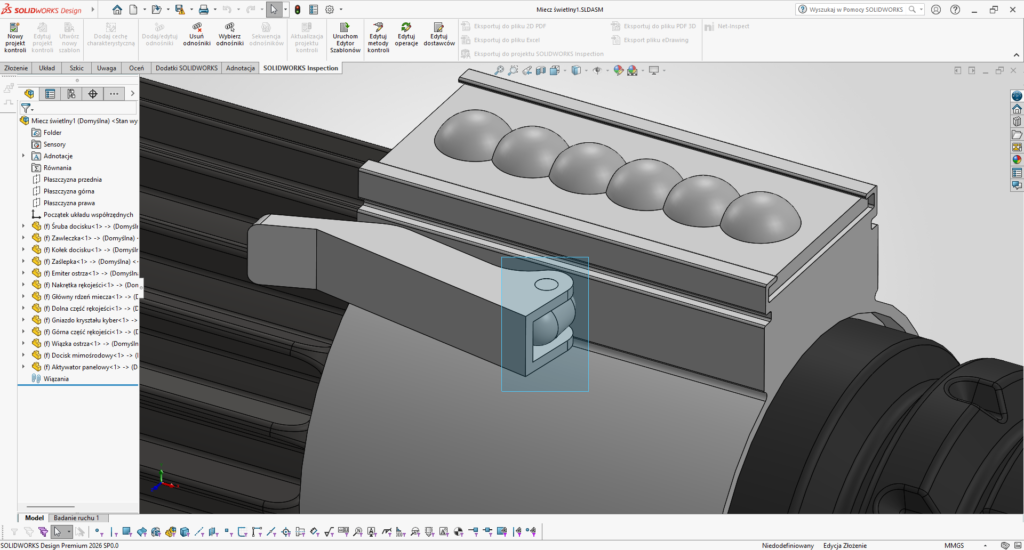 Złożenie w SOLIDWORKS z prostokątem zaznaczania rozpiętym nad komponentem rękojeści